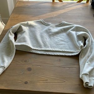 Tahira cropped sweatshirt. Size L. Like new.